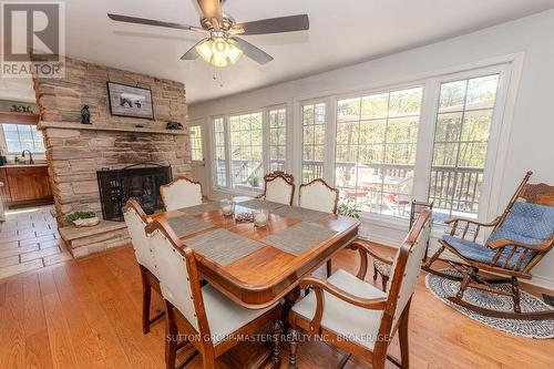 1839 Oak Flats Road, Frontenac (Frontenac Centre), ON - Indoor Photo Showing Dining Room With Fireplace