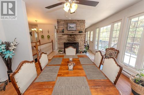 1839 Oak Flats Road, Frontenac (Frontenac Centre), ON - Indoor Photo Showing Dining Room With Fireplace