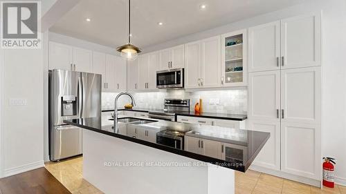 126 Bridlewood Boulevard, Whitby, ON - Indoor Photo Showing Kitchen With Stainless Steel Kitchen With Double Sink With Upgraded Kitchen