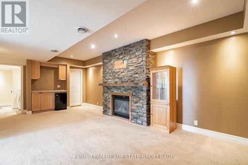 1858 Woods Bay Road, Severn, ON - Indoor With Fireplace
