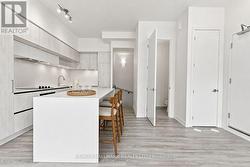 Kitchen with Powder Room and Downstairs Entrance - 