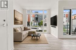 Living Area with Floor to Ceiling Windows - 