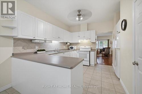 13 - 34 Southbrook Drive, Hamilton, ON - Indoor Photo Showing Kitchen With Double Sink
