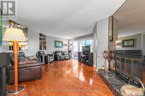 1446 Bourcier Drive, Ottawa, ON - Indoor Photo Showing Living Room With Fireplace
