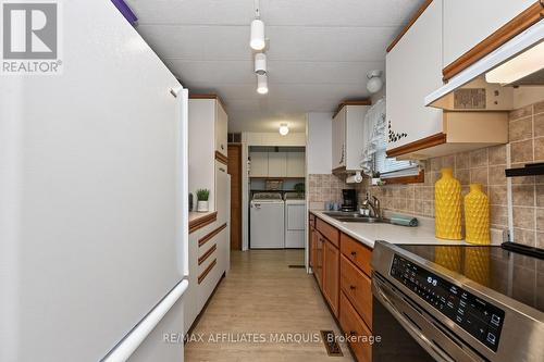 Galley kitchen - 1 Kavanagh Drive, Rideau Lakes, ON - Indoor Photo Showing Kitchen With Double Sink