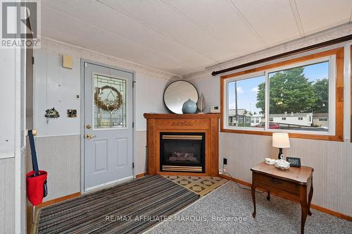 Foyer - 1 Kavanagh Drive, Rideau Lakes, ON - Indoor Photo Showing Living Room With Fireplace