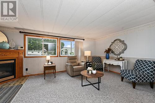 1 Kavanagh Drive, Rideau Lakes, ON - Indoor Photo Showing Living Room With Fireplace