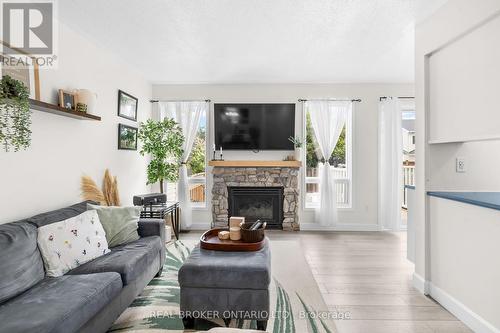 149 Crampton Drive, Carleton Place, ON - Indoor Photo Showing Living Room With Fireplace