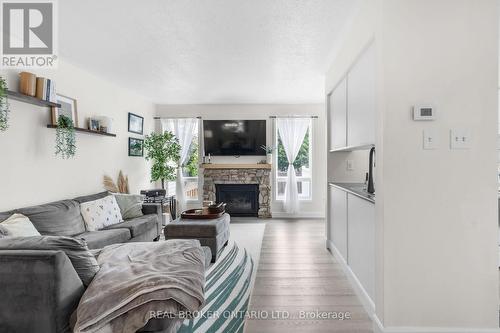 149 Crampton Drive, Carleton Place, ON - Indoor Photo Showing Living Room With Fireplace