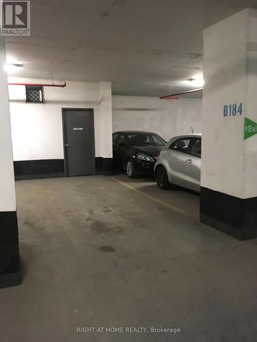 Parking with large private locker behind it - 312 - 2910 Highway No, 7 Road W, Vaughan, ON - Indoor Photo Showing Garage