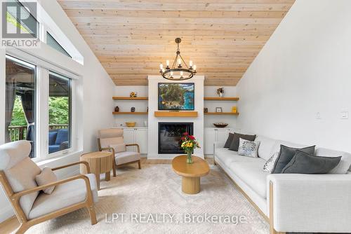500A Hazard Hill Road, Kearney, ON - Indoor Photo Showing Living Room With Fireplace