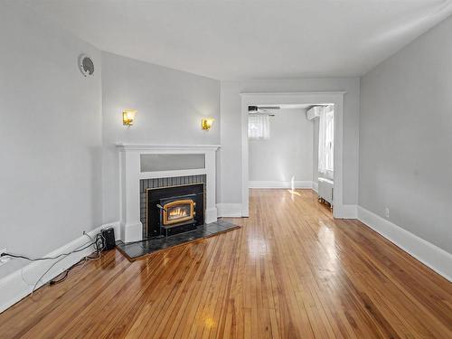 32 Highland Street, Glace Bay, NS - Indoor Photo Showing Living Room With Fireplace