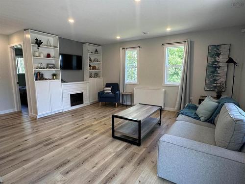 76 Five Rivers Drive, White Point, NS - Indoor Photo Showing Living Room With Fireplace