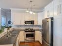 204 24 Harbourside Drive, Wolfville, NS  - Indoor Photo Showing Kitchen With Double Sink With Upgraded Kitchen 
