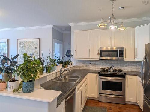 204 24 Harbourside Drive, Wolfville, NS - Indoor Photo Showing Kitchen With Double Sink
