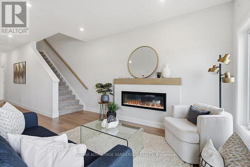 161 Bowman Drive, Middlesex Centre (Ilderton), ON - Indoor Photo Showing Living Room With Fireplace