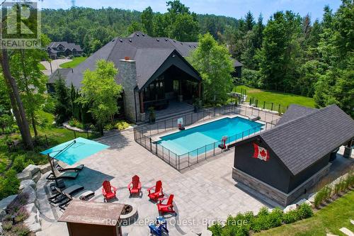 8 Midves Court, Springwater (Midhurst), ON - Outdoor With In Ground Pool