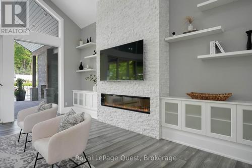8 Midves Court, Springwater (Midhurst), ON - Indoor With Fireplace