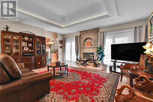 5544 Bridlewood Court, South Dundas, ON - Indoor Photo Showing Living Room With Fireplace