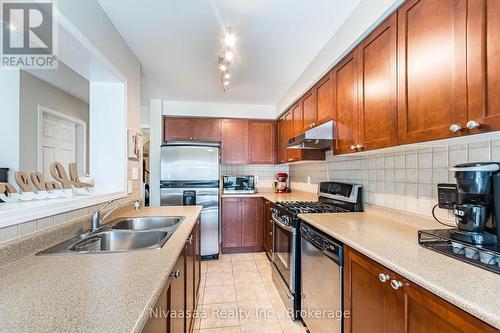 9 Parisian Road, Brampton (Vales Of Castlemore), ON - Indoor Photo Showing Kitchen With Double Sink