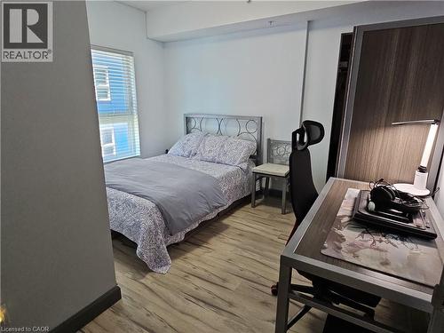Bedroom featuring light wood finished floors - 258B Sunview Street Unit# 255, Waterloo, ON - Indoor Photo Showing Bedroom