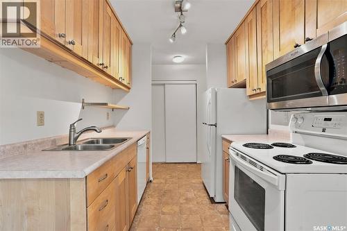 307 211 Tait Place, Saskatoon, SK - Indoor Photo Showing Kitchen With Double Sink