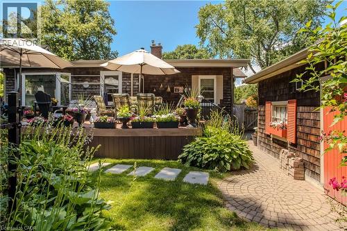 Expansive rear deck with wood-finish flooring - 569 Locust Street, Burlington, ON - Outdoor With Deck Patio Veranda