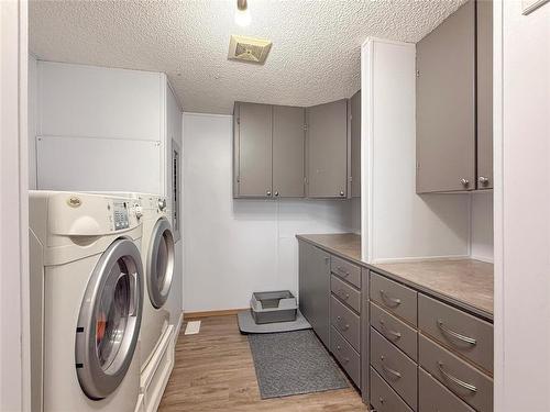 633 Campbell Cove, Brandon, MB - Indoor Photo Showing Laundry Room