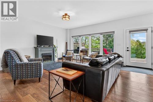 1300 River Road, Cayuga, ON - Indoor Photo Showing Living Room With Fireplace