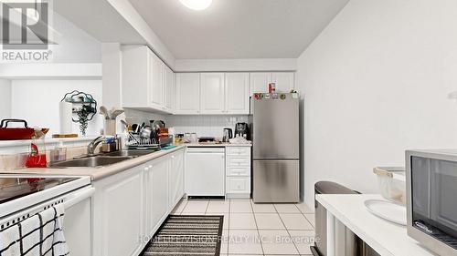710 - 2628 Mccowan Road, Toronto, ON - Indoor Photo Showing Kitchen With Double Sink