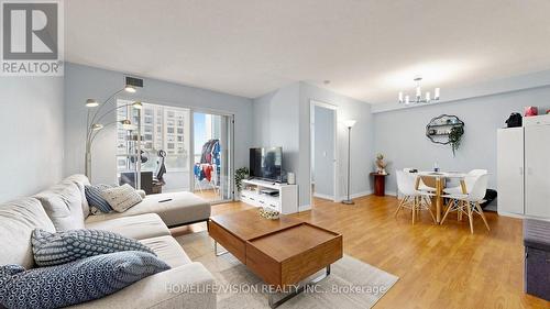 710 - 2628 Mccowan Road, Toronto, ON - Indoor Photo Showing Living Room