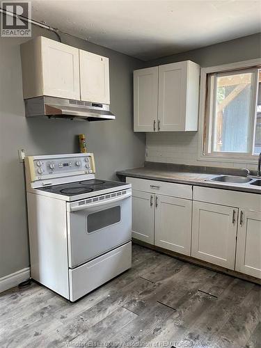 669 Marentette Unit# Main, Windsor, ON - Indoor Photo Showing Kitchen With Double Sink