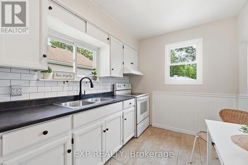 129 East 25Th Street, Hamilton (Eastmount), ON - Indoor Photo Showing Kitchen With Double Sink