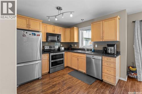 420 303 Slimmon Place, Saskatoon, SK - Indoor Photo Showing Kitchen With Double Sink