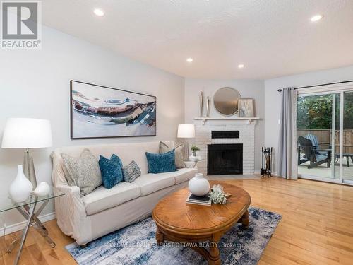75 Sundback Lane, Ottawa, ON - Indoor Photo Showing Living Room With Fireplace