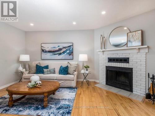 75 Sundback Lane, Ottawa, ON - Indoor Photo Showing Living Room With Fireplace