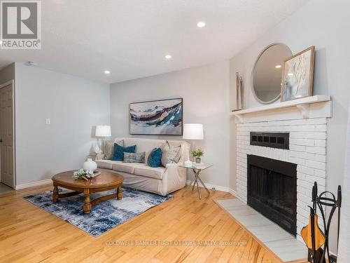 75 Sundback Lane, Ottawa, ON - Indoor Photo Showing Living Room With Fireplace