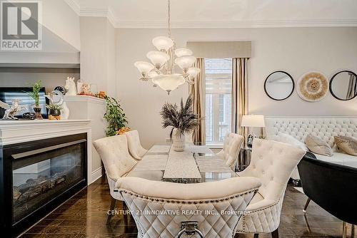 4 Aquilina Court, Ajax, ON - Indoor Photo Showing Dining Room With Fireplace