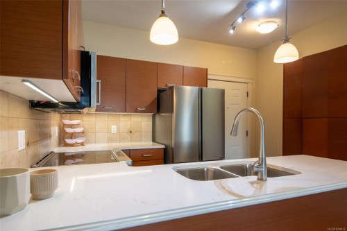 #202-2380 Brethour Ave, Sidney, BC - Indoor Photo Showing Kitchen With Double Sink