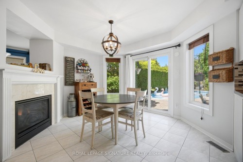 5390 Mcfarren Boulevard, Mississauga, ON - Indoor Photo Showing Dining Room With Fireplace