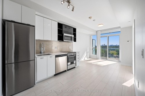 710-10 De Boers Drive E, Toronto, ON - Indoor Photo Showing Kitchen With Stainless Steel Kitchen