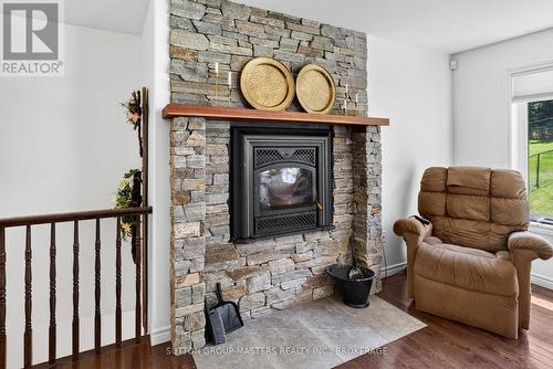 710 Maple Road, Loyalist (Lennox And Addington - South), ON - Indoor Photo Showing Living Room With Fireplace