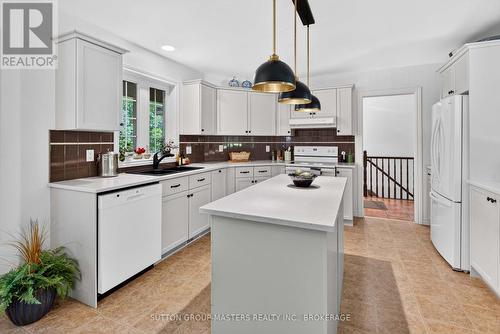 710 Maple Road, Loyalist (Lennox And Addington - South), ON - Indoor Photo Showing Kitchen With Double Sink
