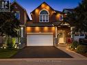 Virtually edited, showcasing gemstone lights - 1114 Northgraves Crescent, Ottawa, ON  - Outdoor With Facade 