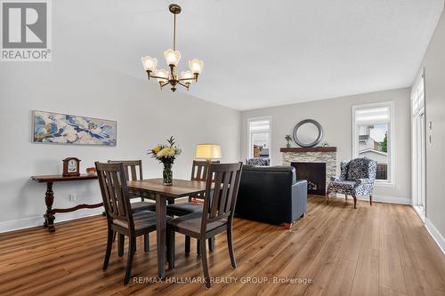75 Sable Run Drive, Ottawa, ON - Indoor Photo Showing Dining Room With Fireplace