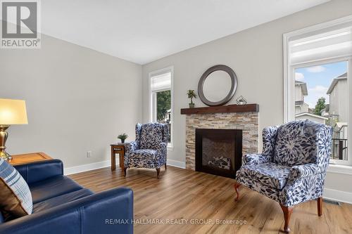 75 Sable Run Drive, Ottawa, ON - Indoor Photo Showing Living Room With Fireplace
