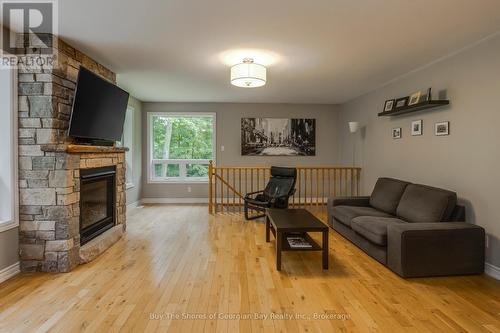 2367 Macdonald Road, Springwater, ON - Indoor Photo Showing Living Room With Fireplace