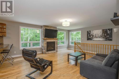 2367 Macdonald Road, Springwater, ON - Indoor Photo Showing Living Room With Fireplace
