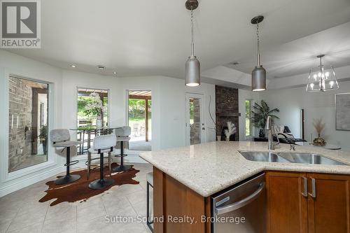 Kitchen nook and peninsula with Granite - 505556 Grey Road 1 Road, Georgian Bluffs, ON - Indoor