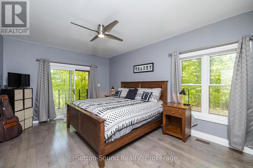 Secondary Res Primary Bedroom with view to Lake - 505556 Grey Road 1 Road, Georgian Bluffs, ON - Indoor Photo Showing Bedroom